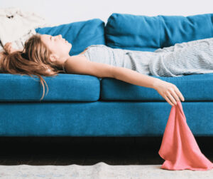 woman sleeping on sofa